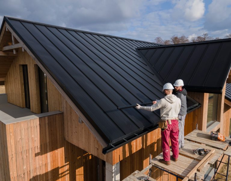 full-shot-roofers-working-together-with-helmets.jpg