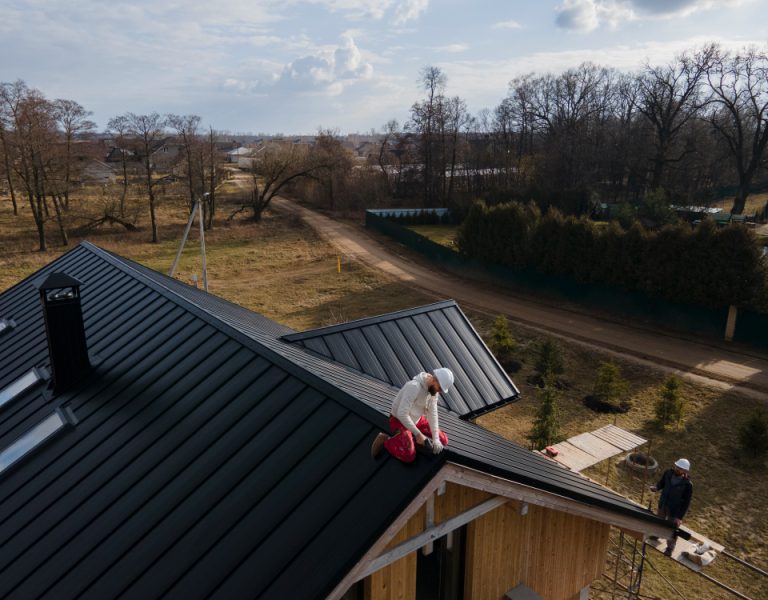 long-shot-roofer-working-with-helmet.jpg
